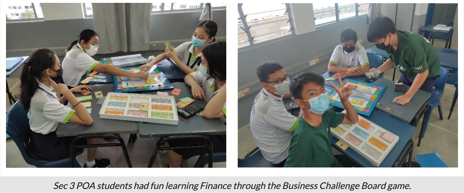 Students wearing masks sit at desks playing a colorful board game with cards and game pieces in a classroom.